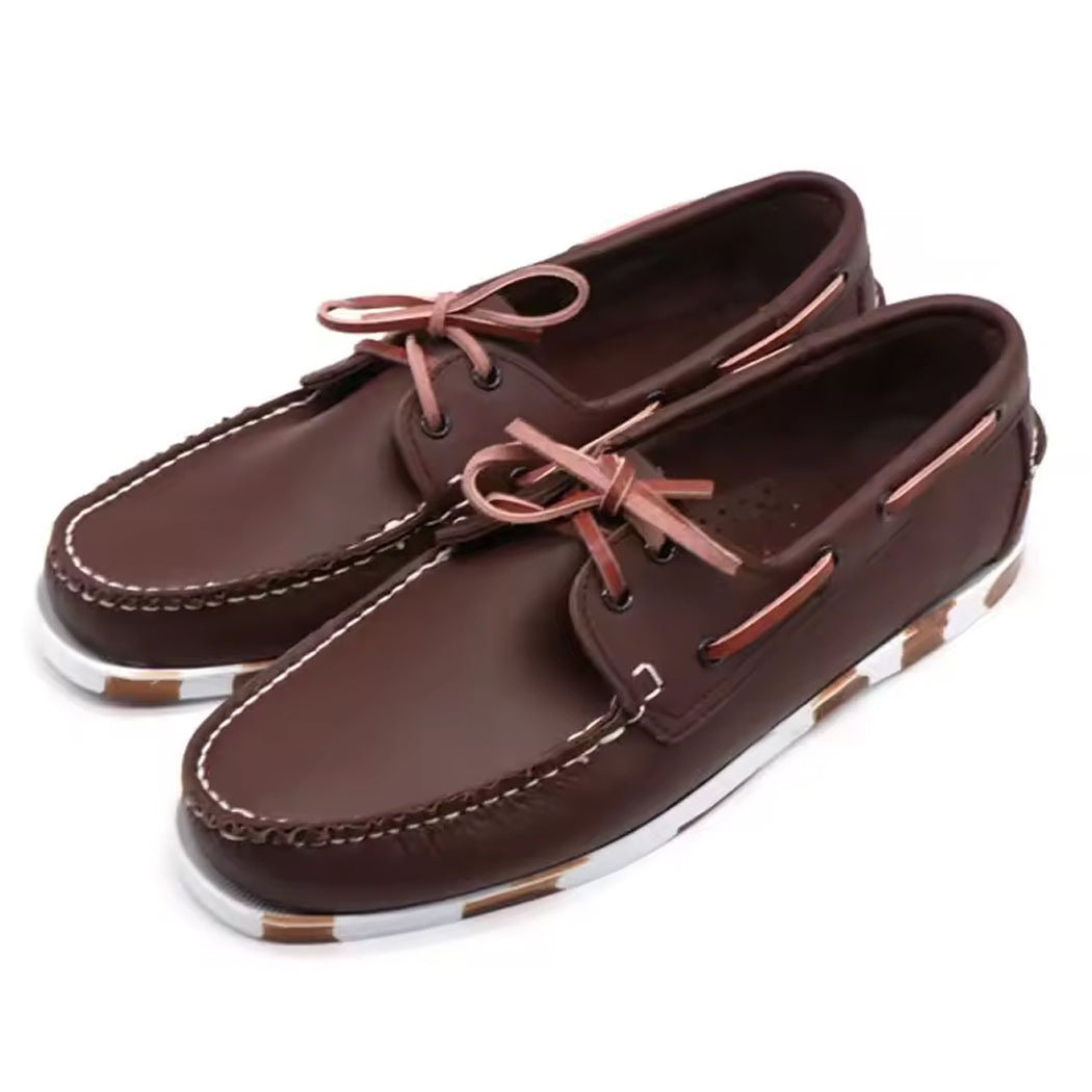 Leren bootschoen met gekleurde zool