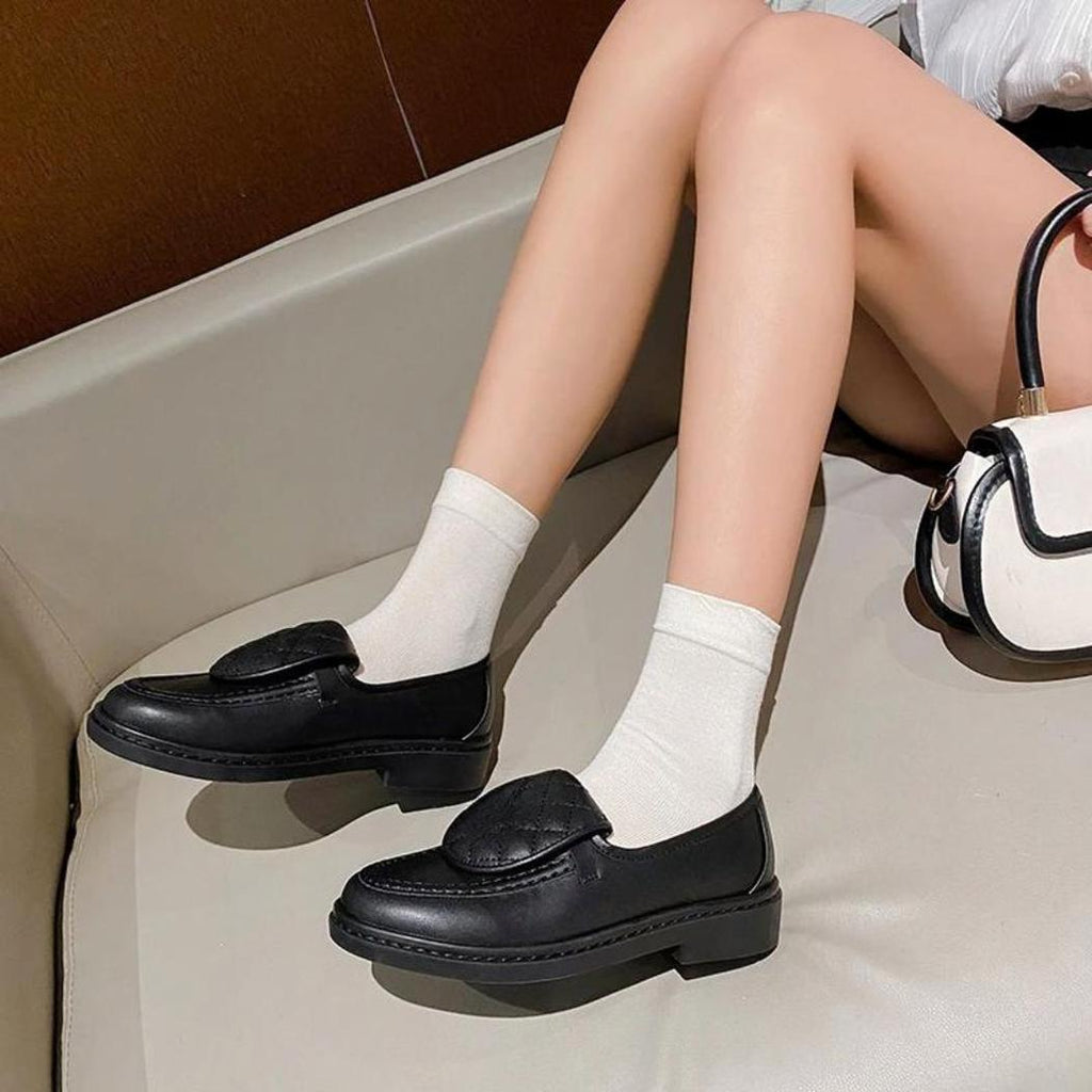 Dames loafers met gewatteerd bovenstuk en blokhak