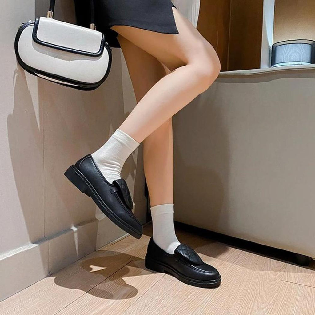 Dames loafers met gewatteerd bovenstuk en blokhak