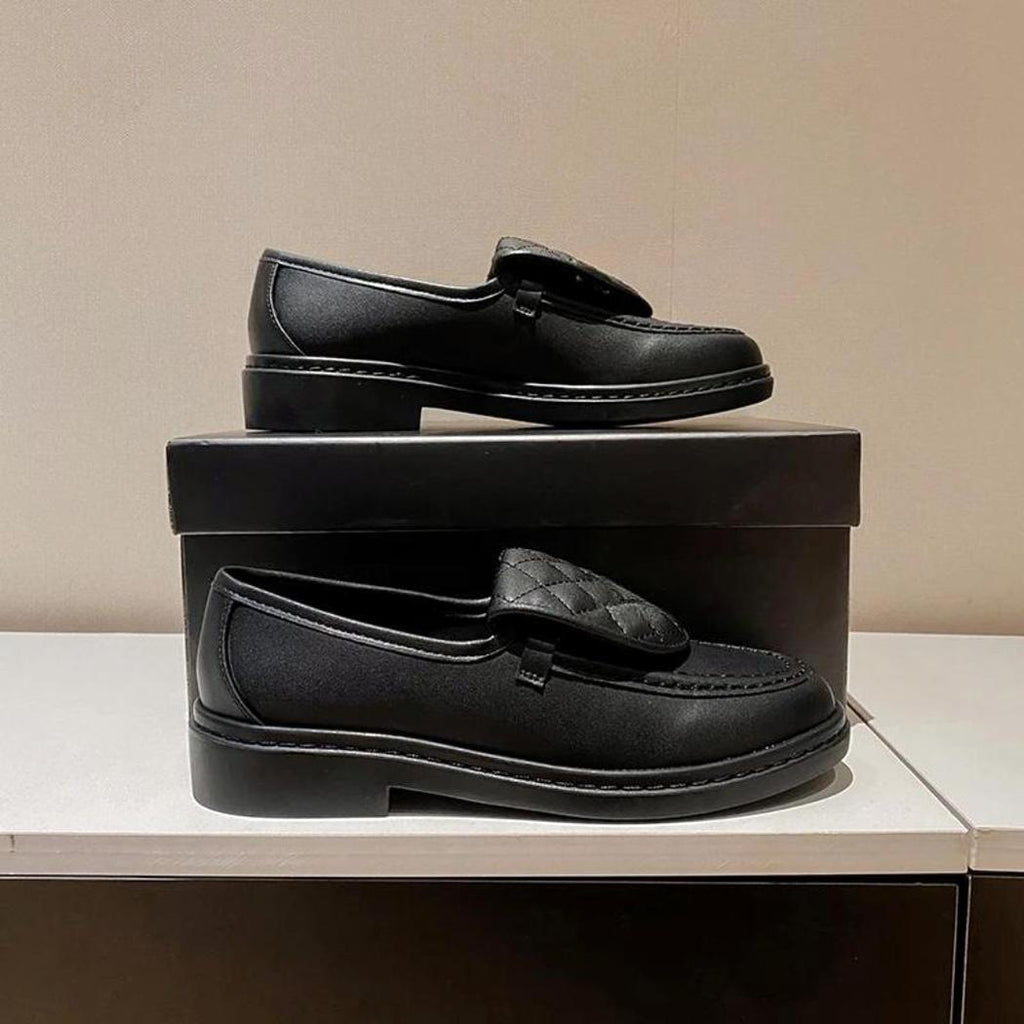 Dames loafers met gewatteerd bovenstuk en blokhak