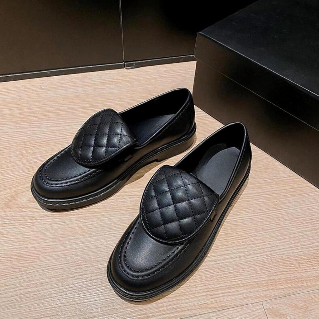 Dames loafers met gewatteerd bovenstuk en blokhak