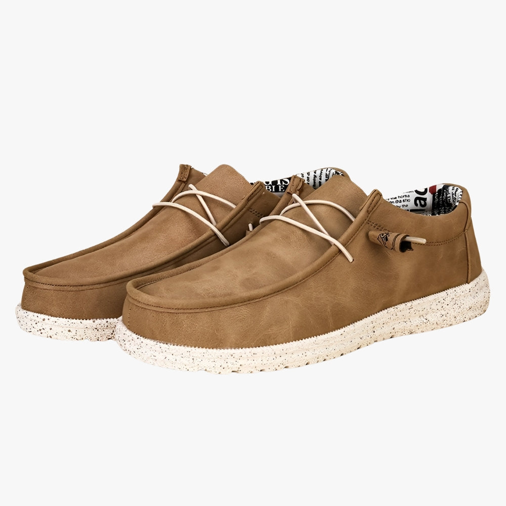 Instaploafers van bruin synthetisch leer met een witte zool