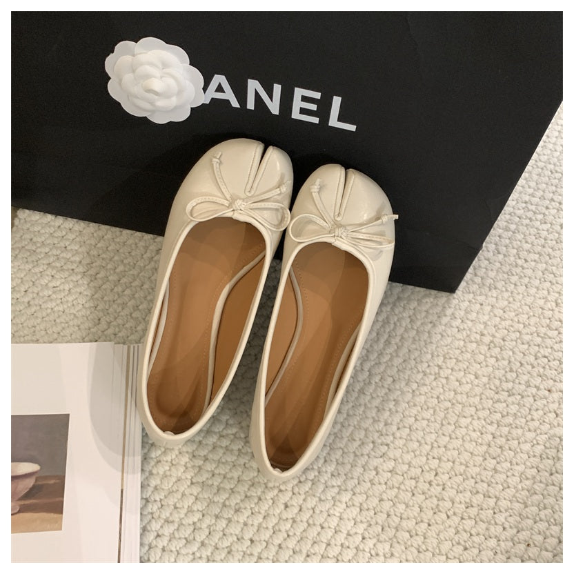 Platte tabi ballerina's met decoratieve strik