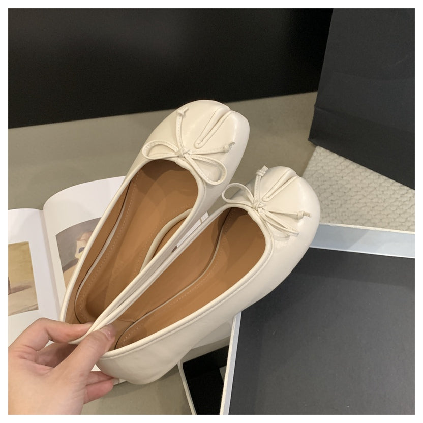 Platte tabi ballerina's met decoratieve strik