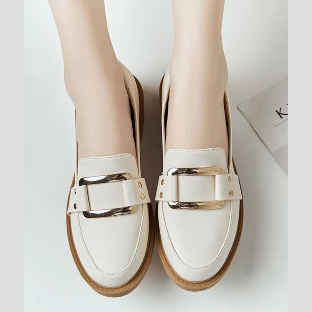 Camelkleurige rubberen zool van de beige mocassin