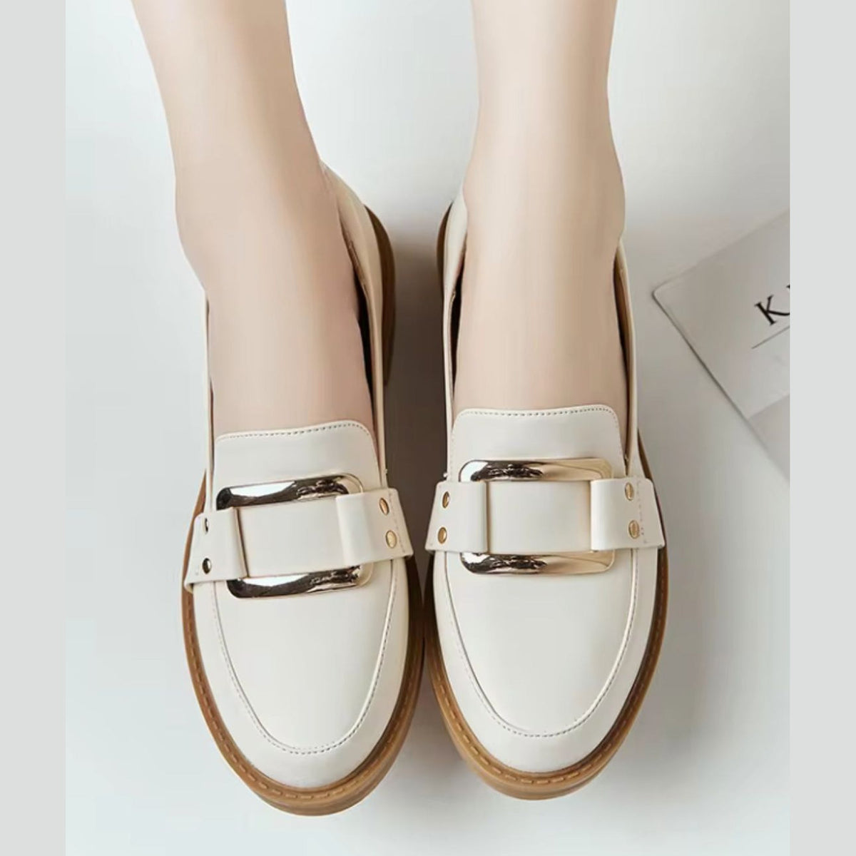 Camelkleurige rubberen zool van de beige mocassin