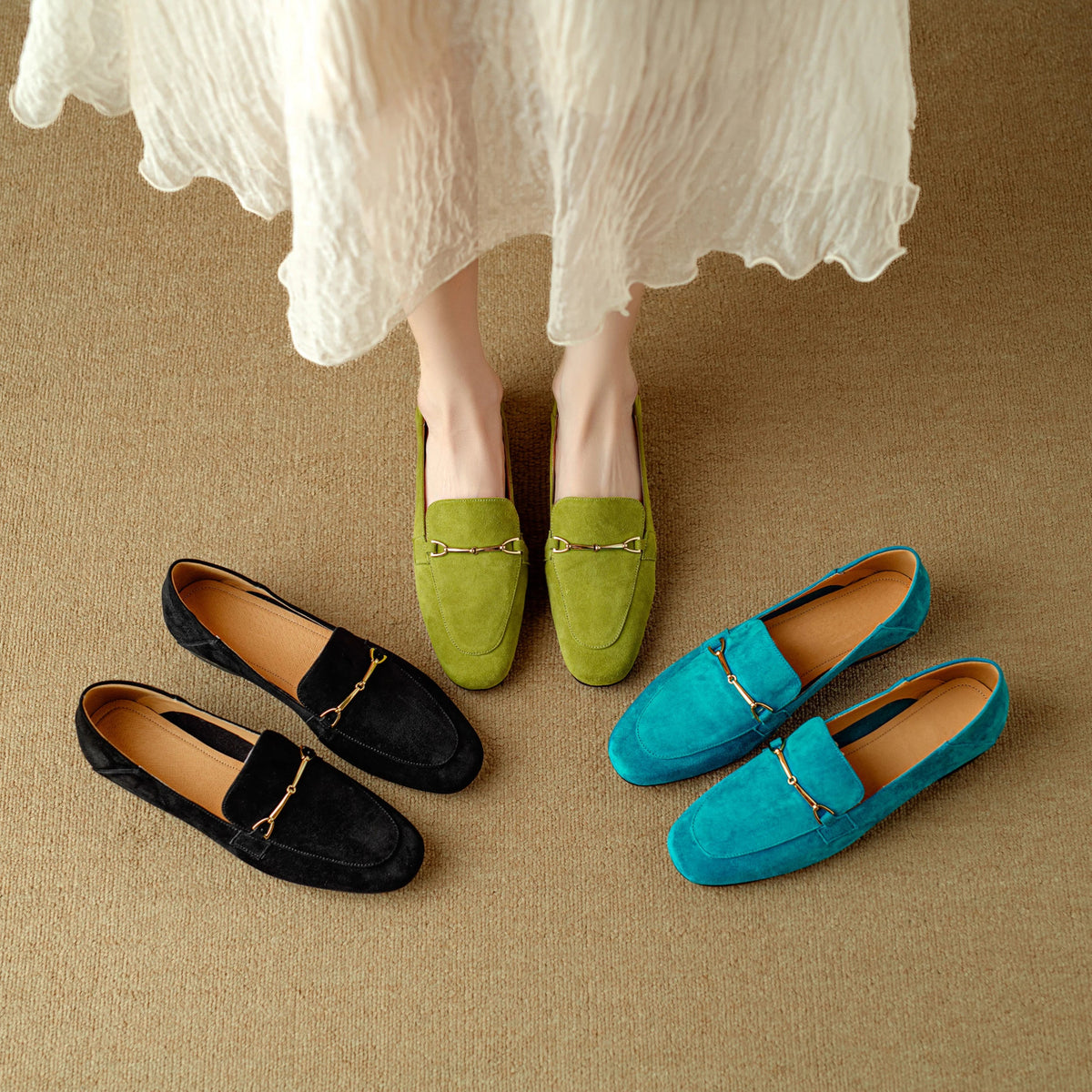 Dames loafer met gouden gesp, detail van de zool