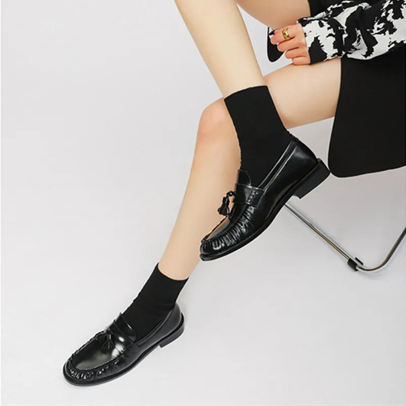 Dames loafer met kwastjes en franjes, zijaanzicht