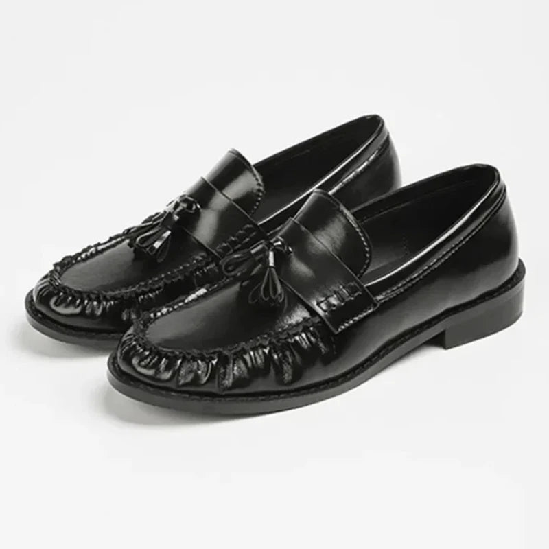 Dames loafer met kwastjes en franjes, detail van de zool