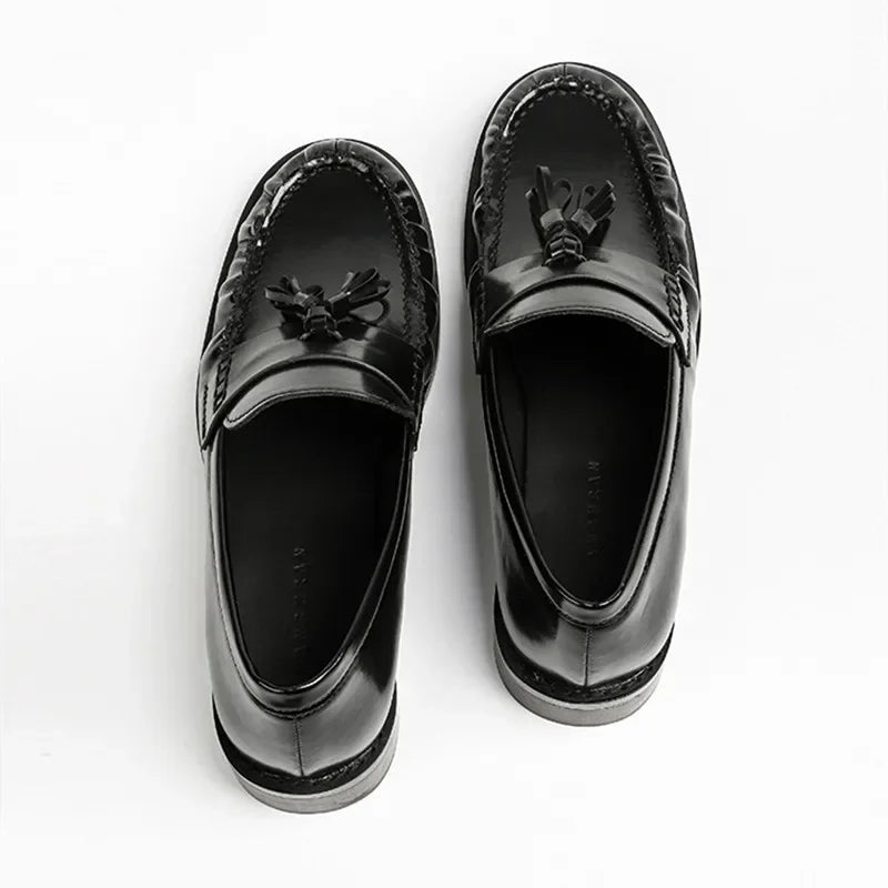 Dames loafer met kwastjes en franjes, achterkant van de schoen