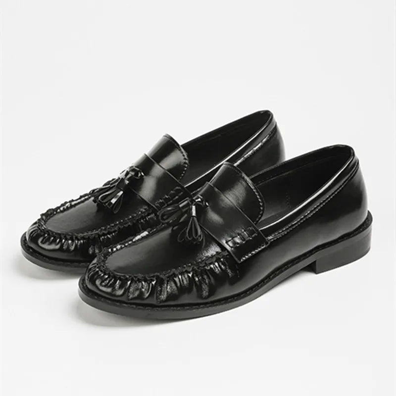 Dames loafer met kwastjes en franjes, paar van voren