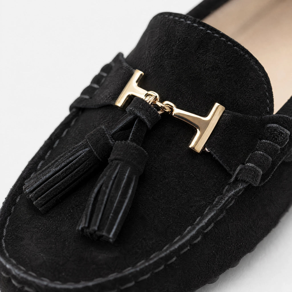 Damesloafer met kwastjes en gouden bit in marineblauw, zijaanzicht
