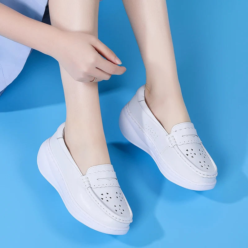 Damesloafer in wit met roze hak