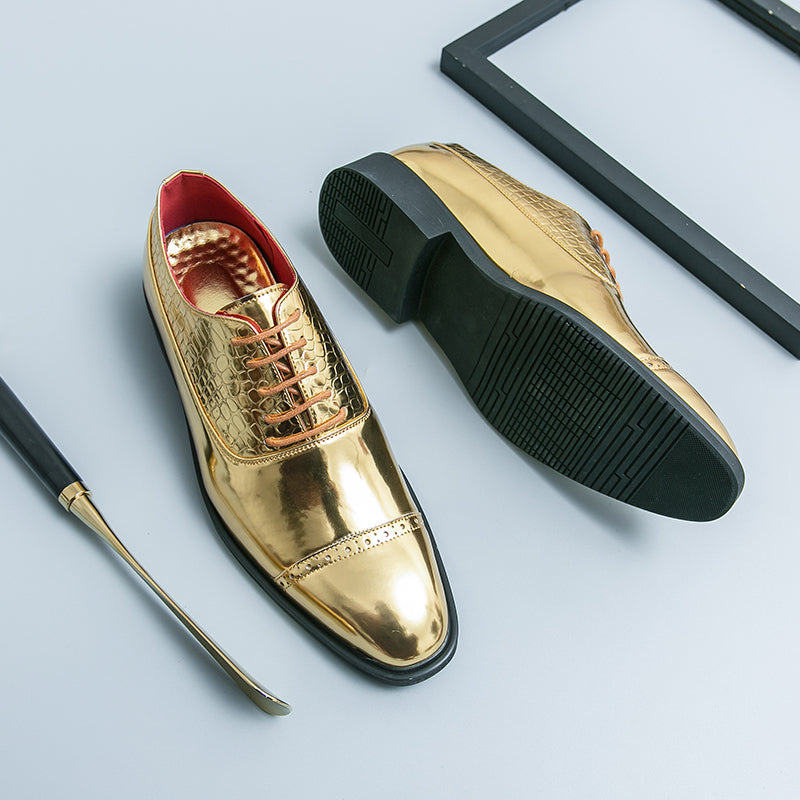Elegante gouden loafers met slangendesign voor heren