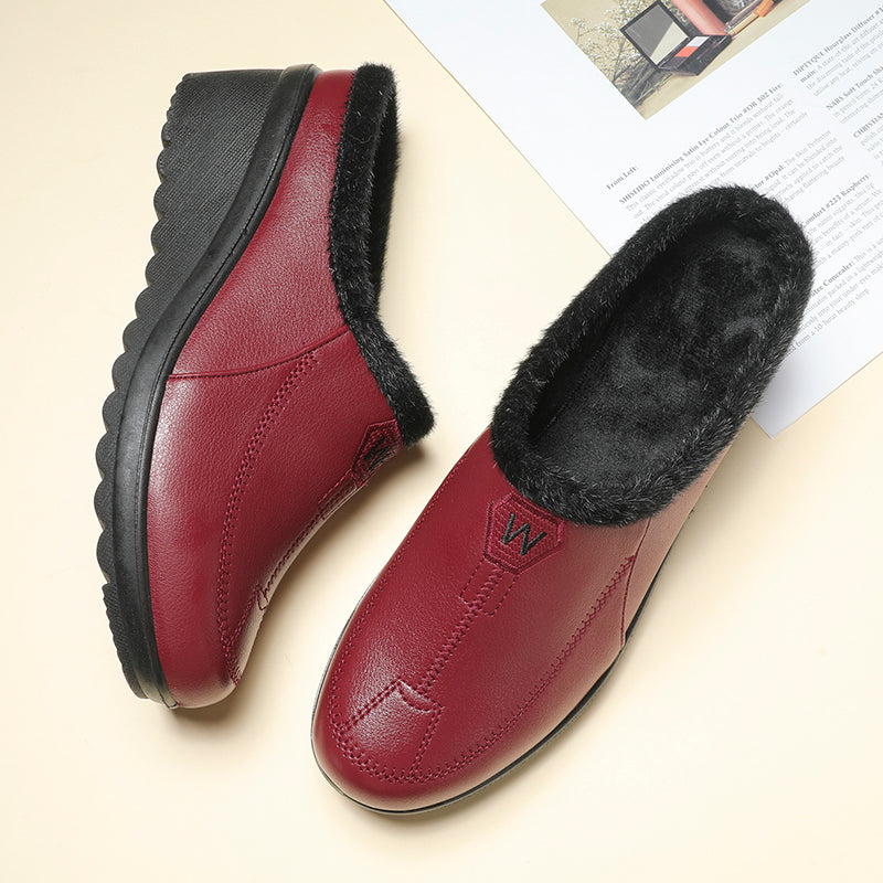 Gevoerde mocassins met sleehak instappers voor dames