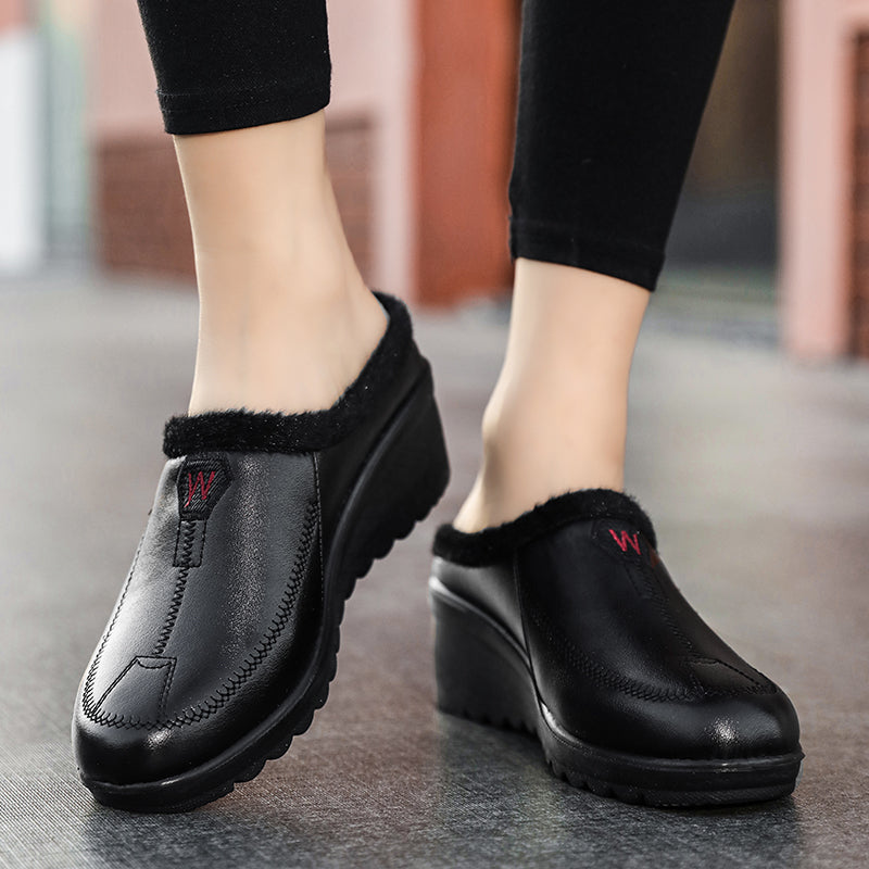 Gevoerde mocassins met sleehak instappers voor dames