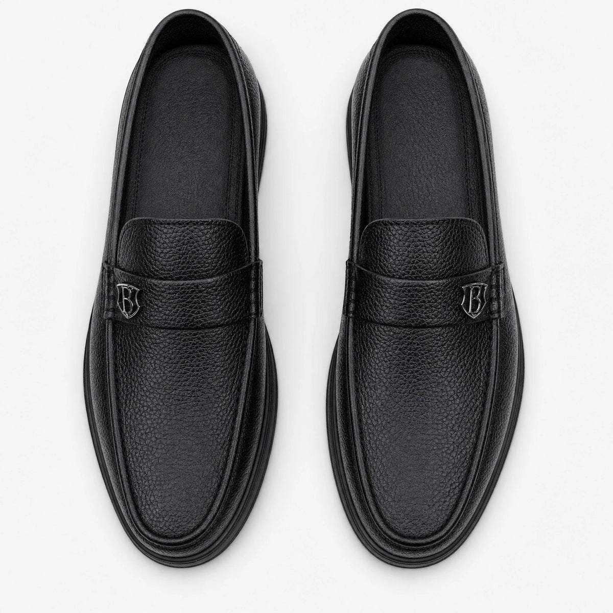 Zwarte heren mocassin met dikke zool, zijaanzicht