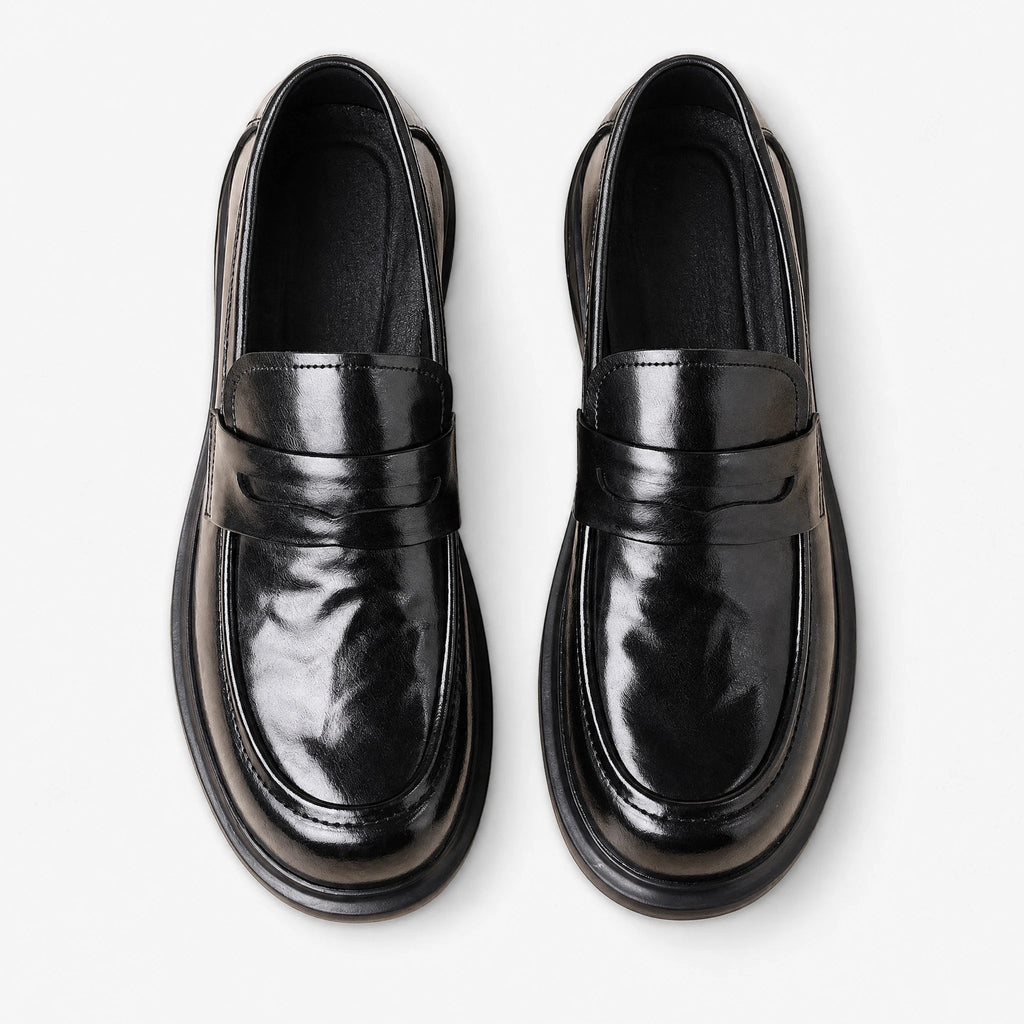 Penny loafer voor heren van splitleer met dikke zool, zijaanzicht