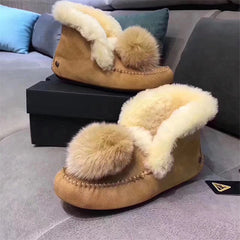 Indiaanse mocassins in gevoerd suède met pompon, Beige