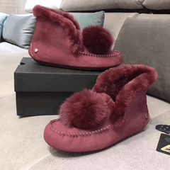 Indiaanse mocassins in gevoerd suède met pompon, Rood