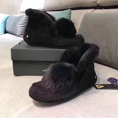 Indiaanse mocassins in gevoerd suède met pompon, Zwart