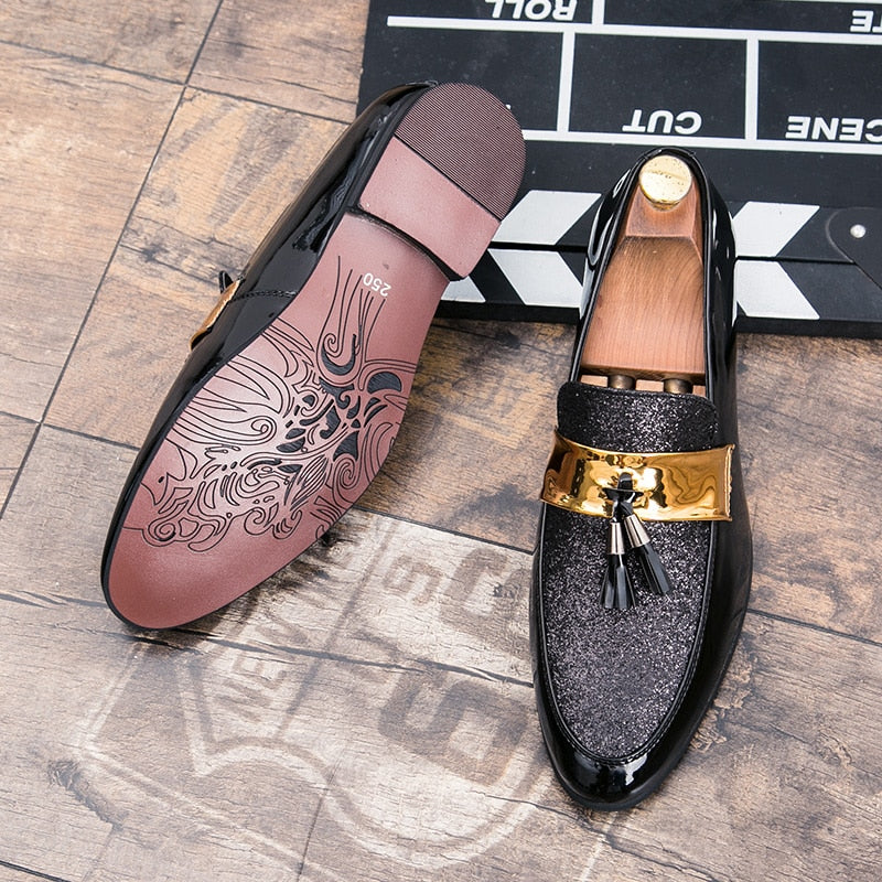 Loafers met kwastjes in leer en gouden bandje voor heren