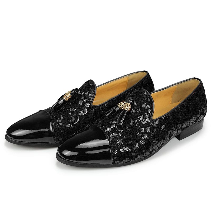 Gelakte loafers met kwastjes en pailletten