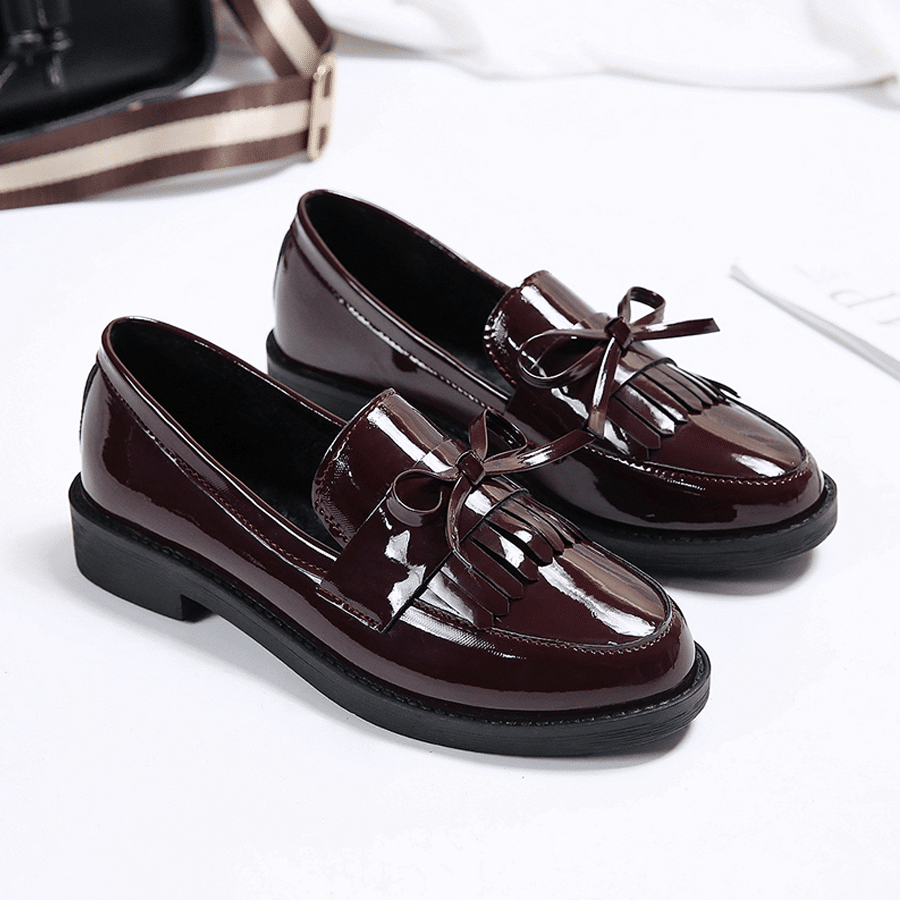 Lakleren loafers met strik voor dames
