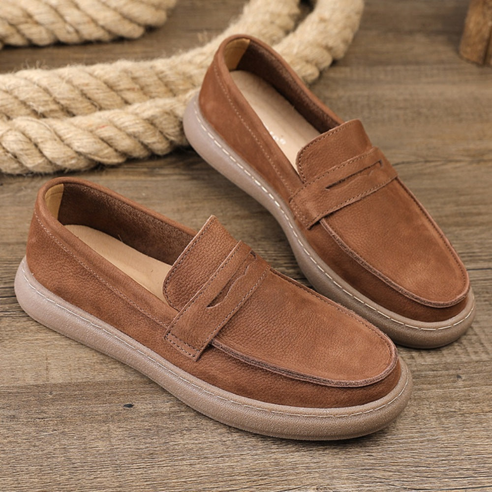 Detail van de decoratieve lus op de mocassin