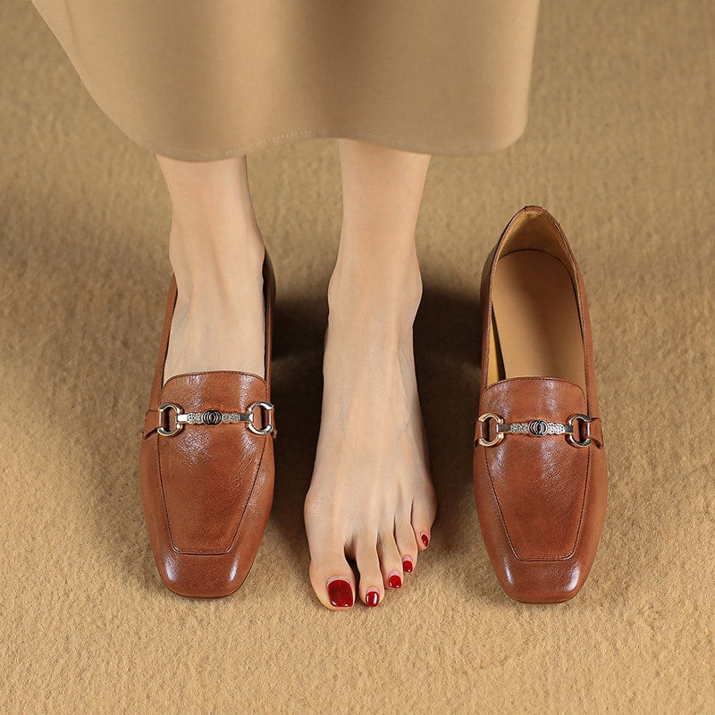 Leren loafers met hak en bit
