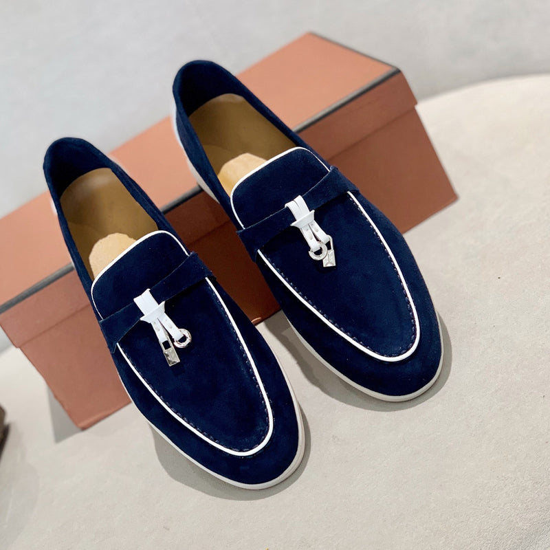 Instappers met kwastjes voor heren met elegante details en een oranje schoenendoosbodem