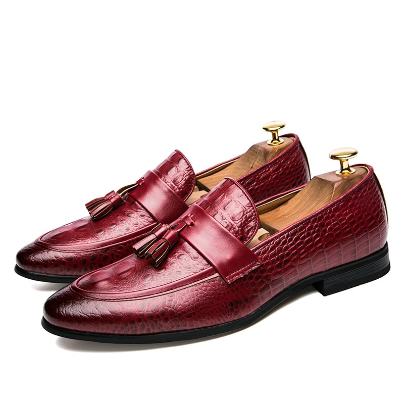 Loafers met kwastjes en krokodillenleer effect