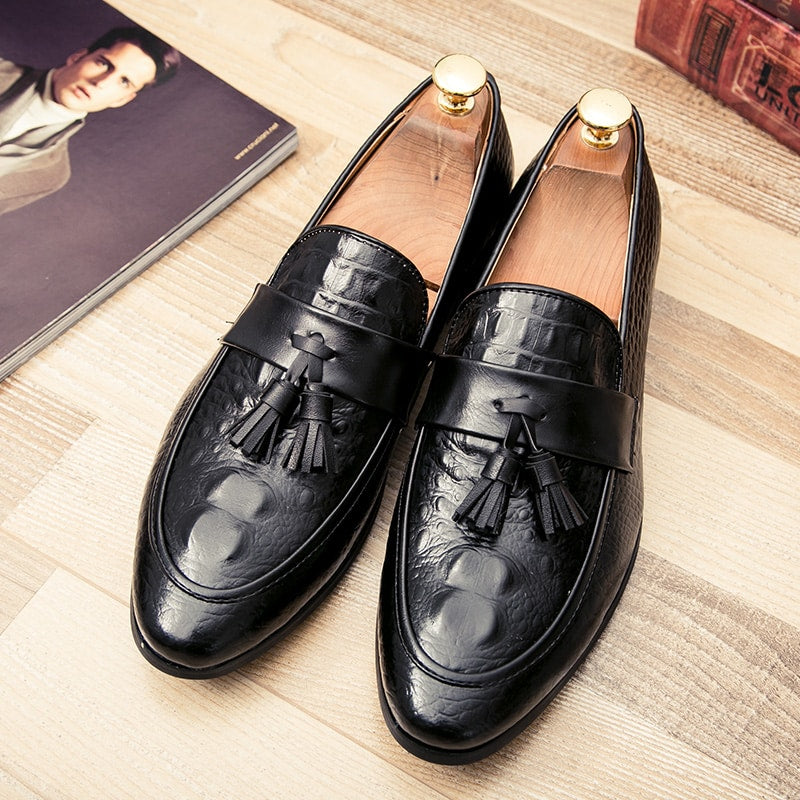 Loafers met kwastjes en krokodillenleer effect
