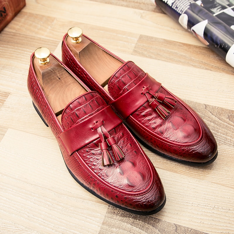 Loafers met kwastjes en krokodillenleer effect
