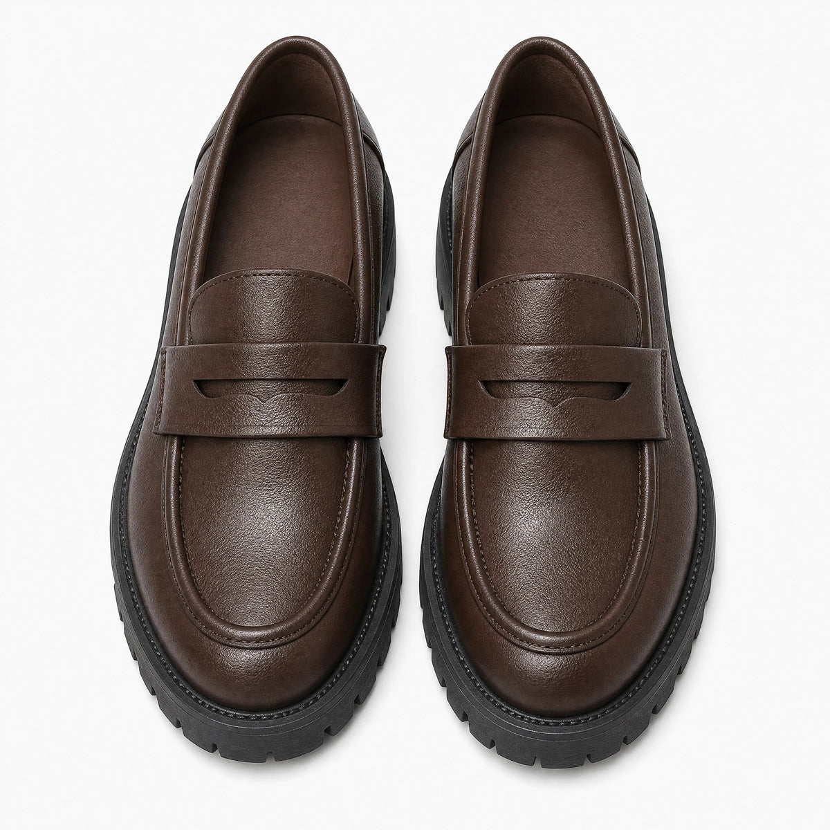 Damesmocassins met profielzool en plateau, bruin of zwart, zijaanzicht Afbeelding