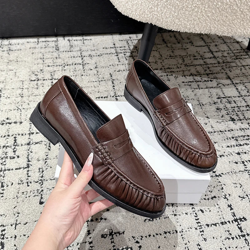 Penny loafer dames glad leer in cognac, paar van opzij