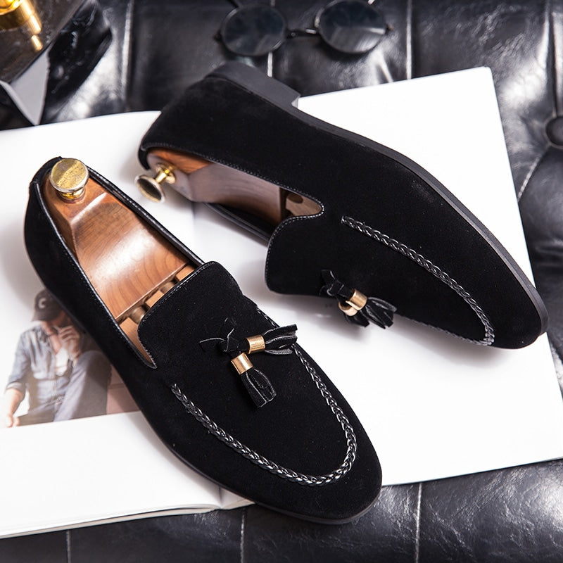 Suedelook loafers met kwastjes en kunstleren torsade