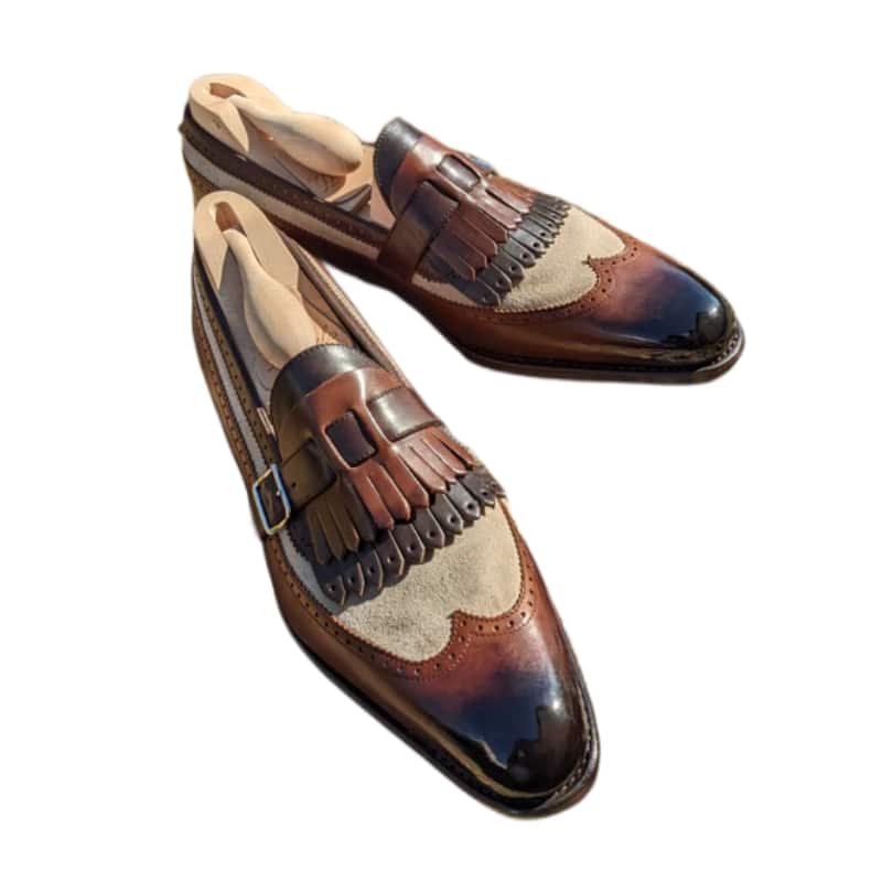 Tweekleurige loafers met franjes en gesp