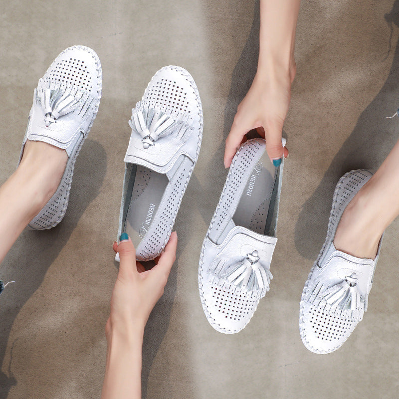 Zachte geperforeerde loafers met kwastjes voor dames