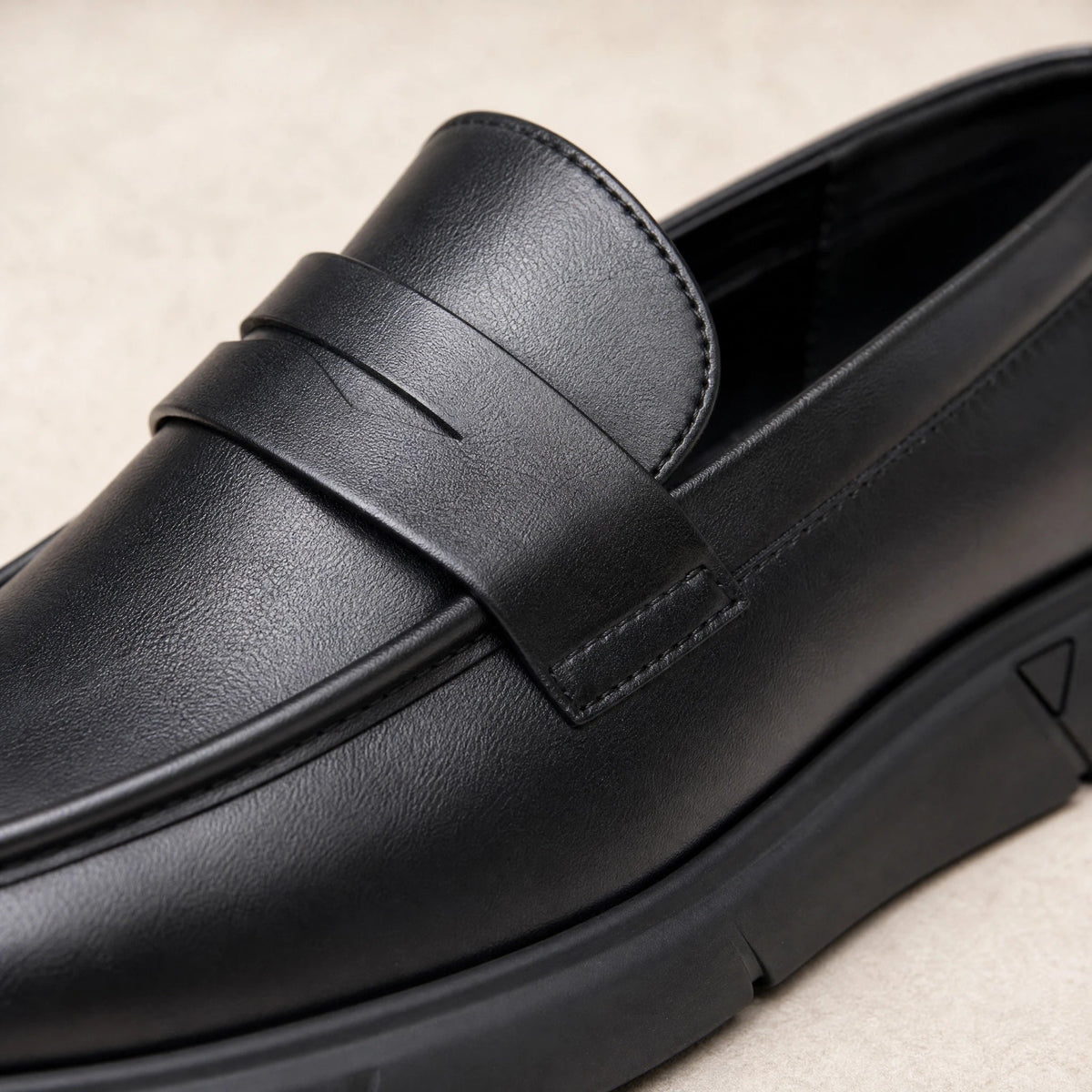 Decoratief lipje van de zwarte mocassin Afbeelding