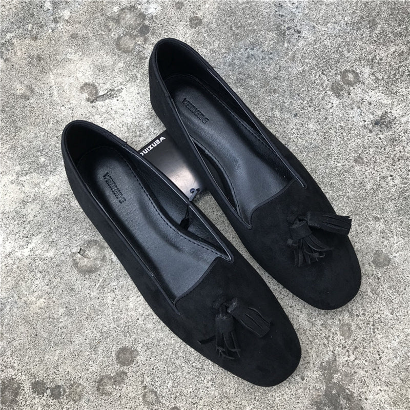 Zwarte suède-effect loafers met kwastjes voor dames