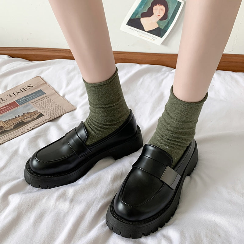 Zwarte loafers met plateau in Britse stijl voor dames